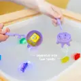 Senzorické nádoby a naberačky Glo Pals